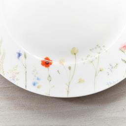 Kaffeservis i porslin med blommigt mönster