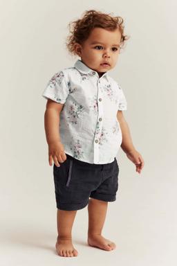 Mörkblå vävda babyshorts med fickor