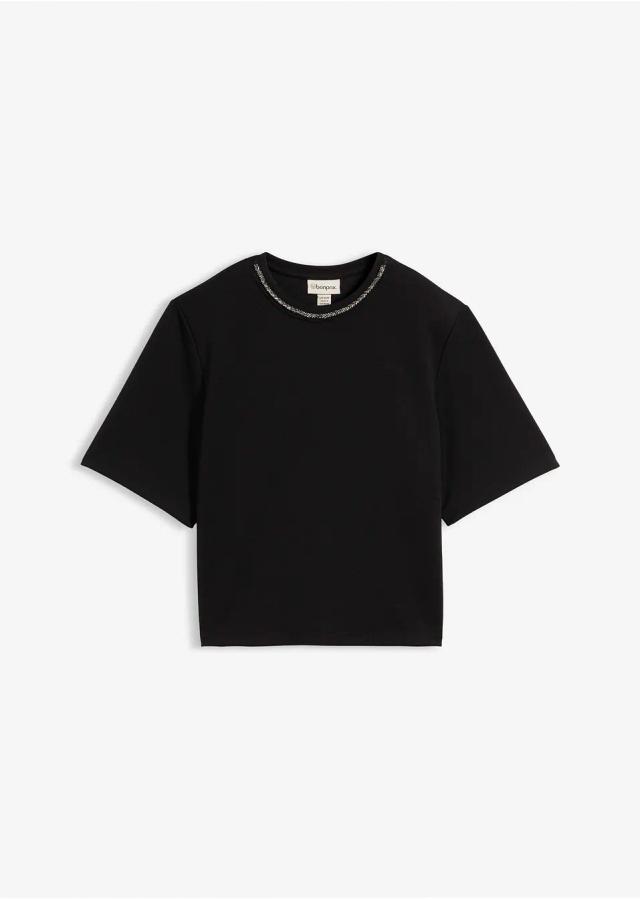 Elegant oversizetopp med dekorativ ringning