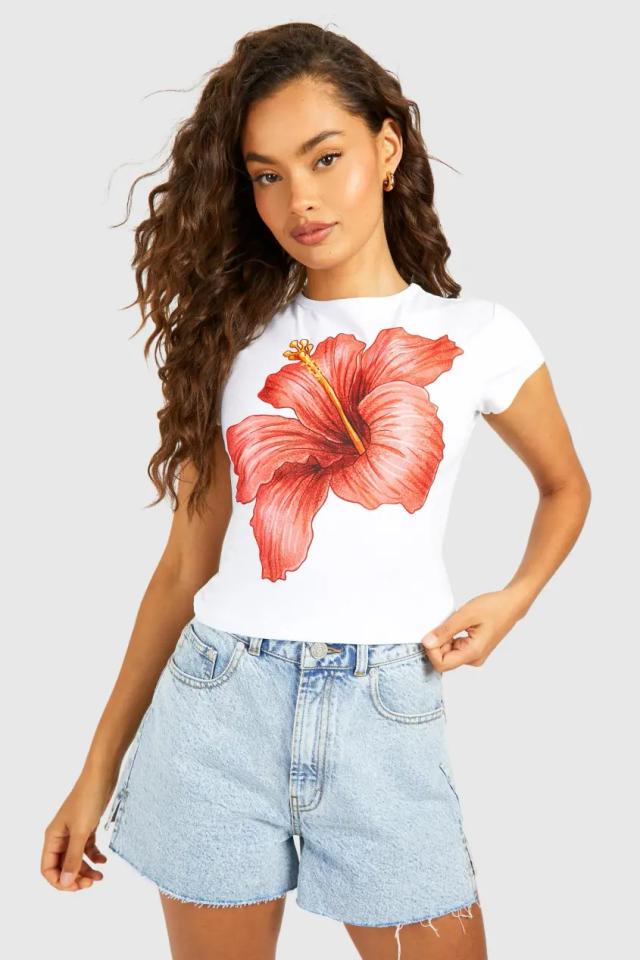 Vit blommig baby-T-shirt med kepsärm